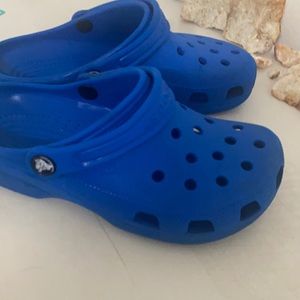 I am selling blue women’s crocs